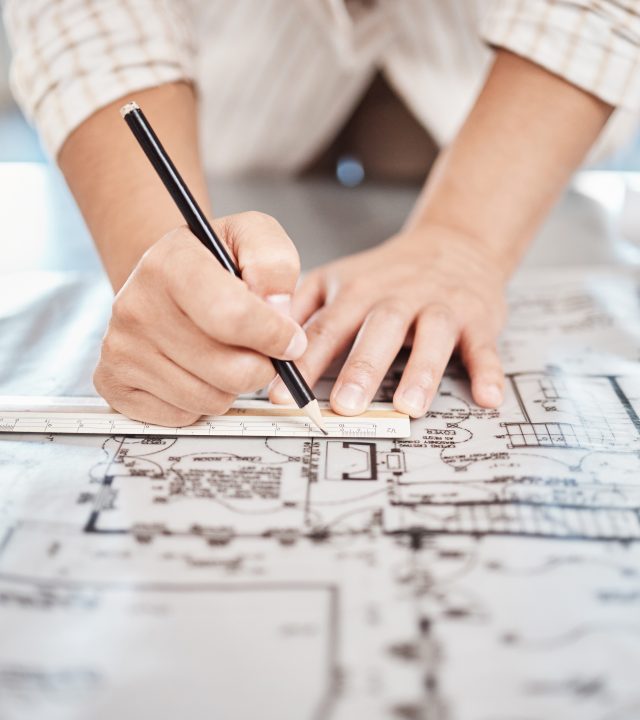 Architect drawing building floor plan, design blueprint map and engineer drafting structure on table paper. Real estate development work office construction and industrial wall safety ruler Architect drawing building floor plan, design blueprint map and engineer drafting structure on table paper. Real estate development work, house office construction and industrial wall safety ruler